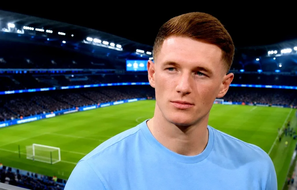Elliot Anderson in a Manchester City shirt during his unveiling, speaking about Kevin De Bruyne's influence on his career.