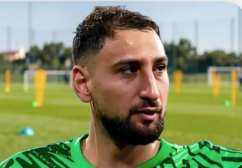 Gianluigi Donnarumma in action for Manchester City, making a save