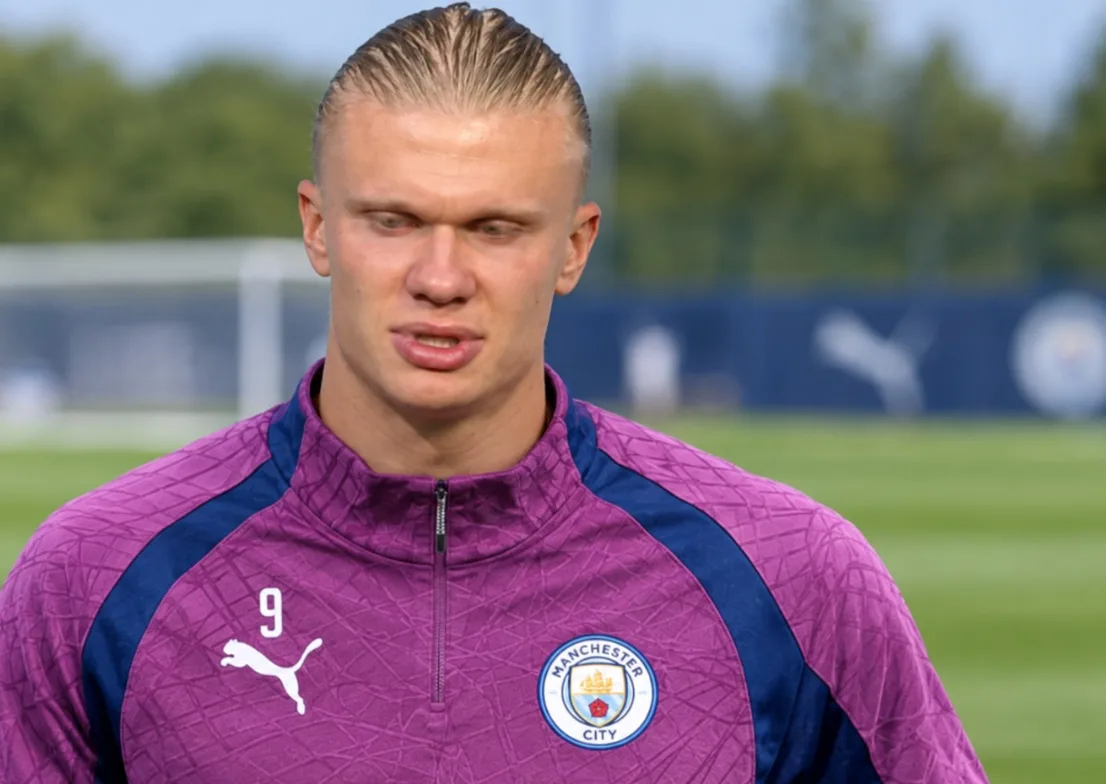 Erling Haaland in action for Manchester City, with talkSPORT expert Andy Brassell suggesting a future Bayern Munich move.